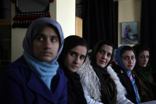 Kabul. Afghanistan. 2012
A meeting of Mirman Baheer, the Ladies’ Literary Society, in Kabul. The group has roughly one hundred members in Kabul, where they meet openly on most Saturdays. The city of Kabul is, in many ways, a bubble. Its security allows women to gather openly, a near impossibility across most of the country. Outside Kabul, there are as many as three hundred members in the outlying provinces of Khost, Paktia, Wardak, Mazar, Kunduz, Jalalabad, Kandahar, Herat, and Farah. Exact numbers of members are impossible to come by, since the society operates in secret by necessity.